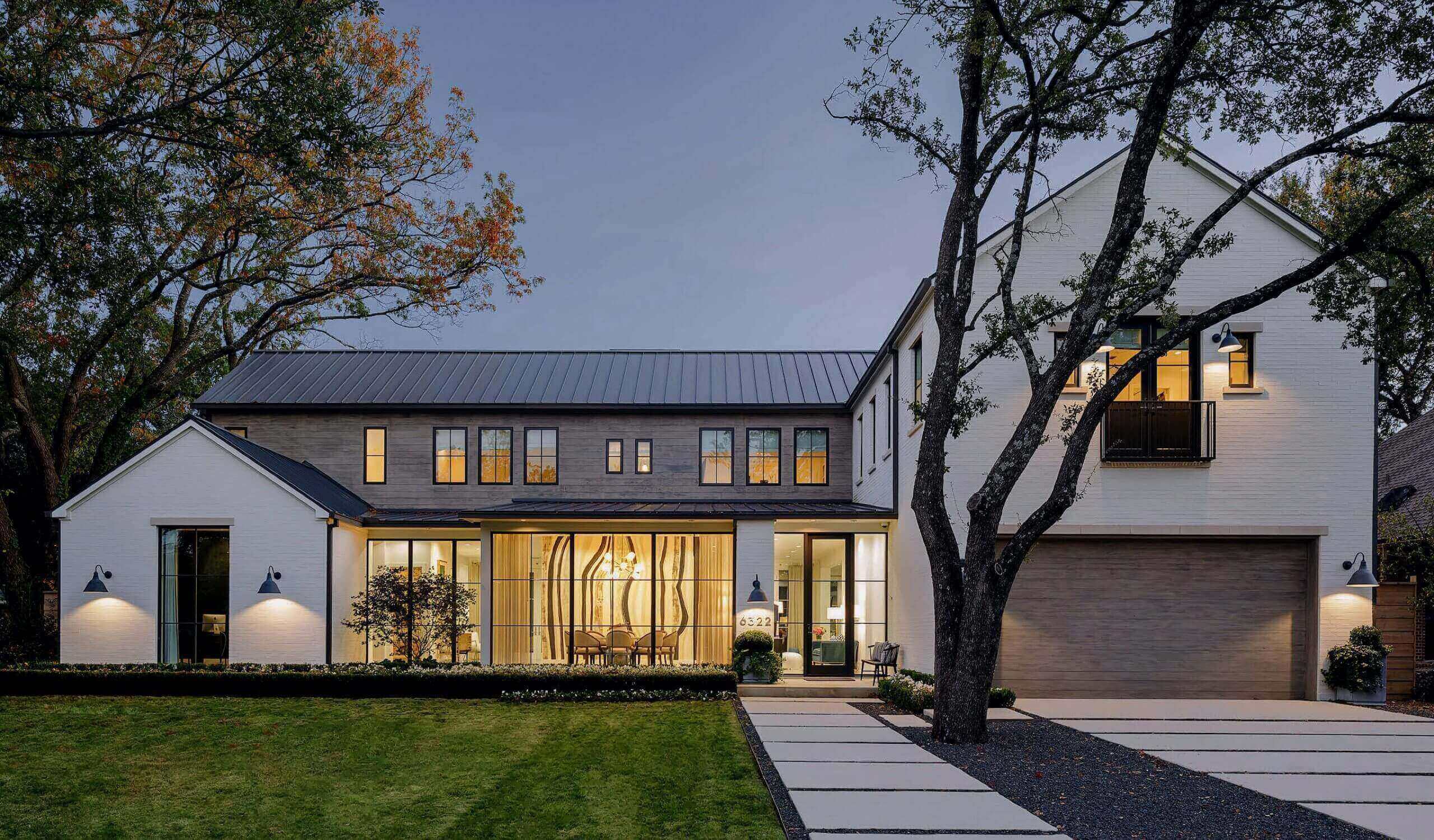 Modern farmhouse at dusk - Hero background